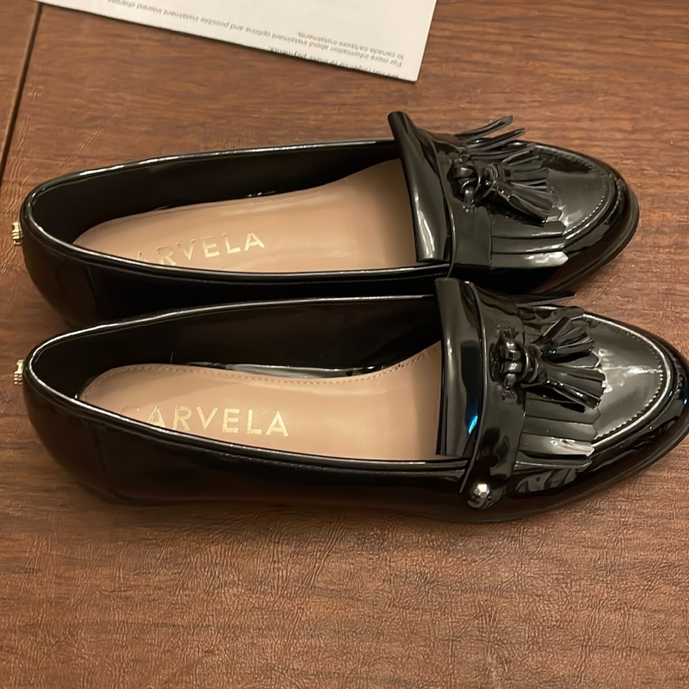 Almost new classic Kurt Geiger Carvela size 41 black patent loafers